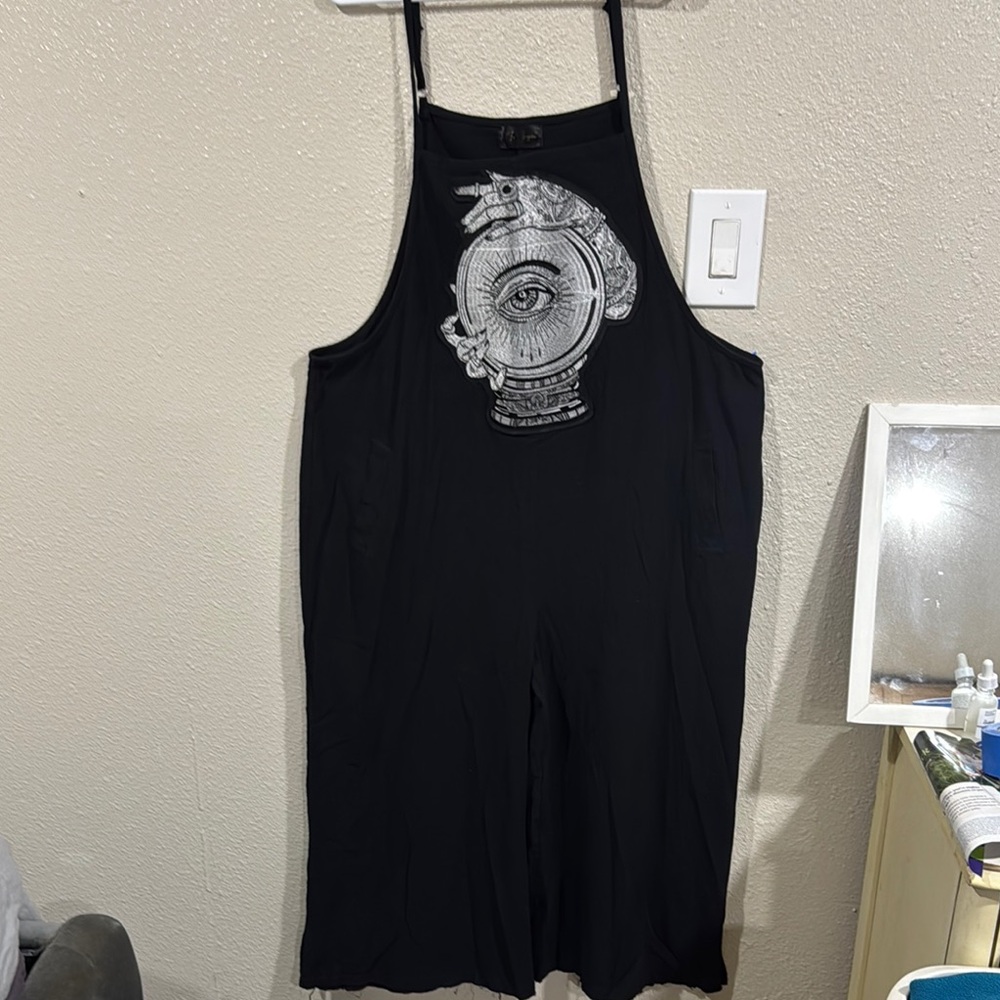 Black Wide-Leg Jumpsuit with Graphic Chest